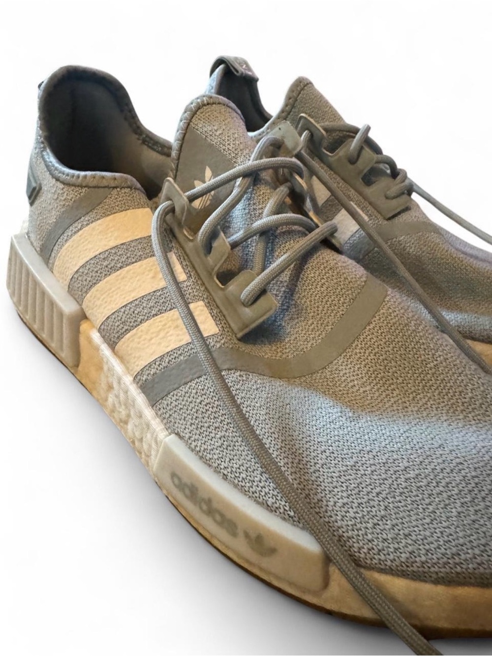 Adidas Men’s 10.5 size light blue Knit Sneakers with Cream Stripes